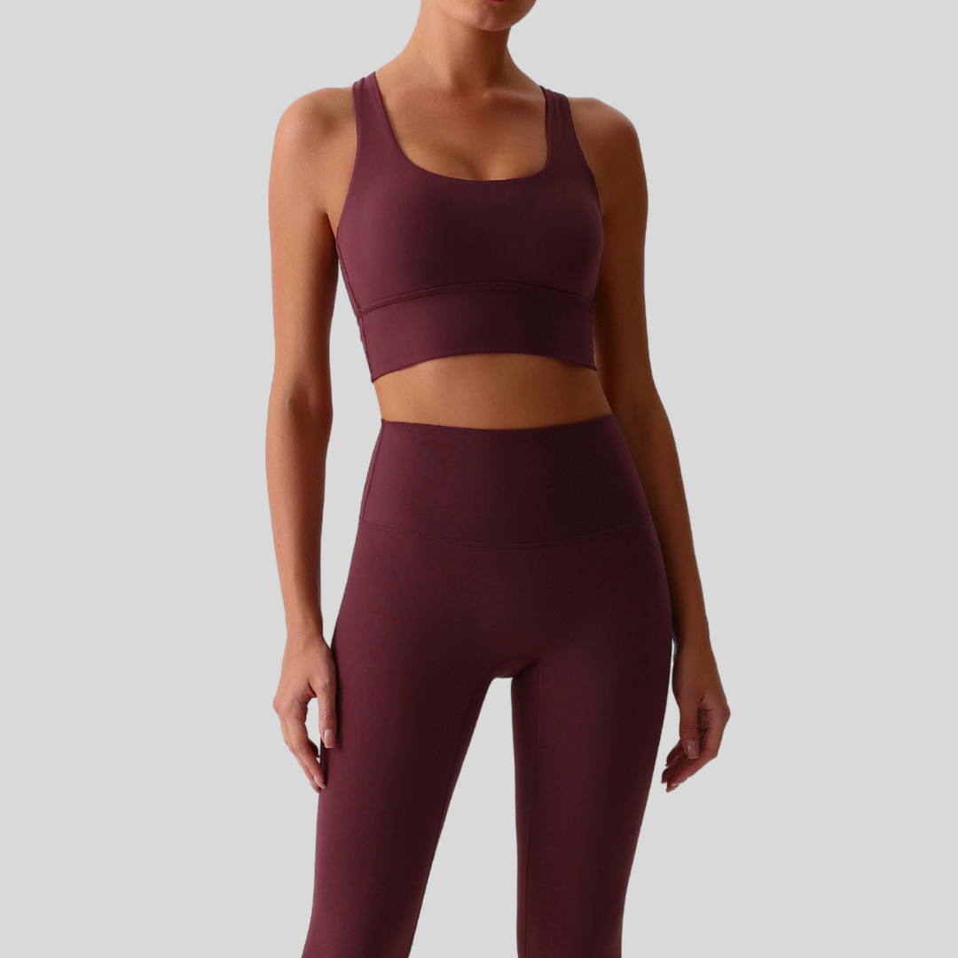 Close-up of KAOS The Label Isla Set red-brown fabric texture and stitching details.