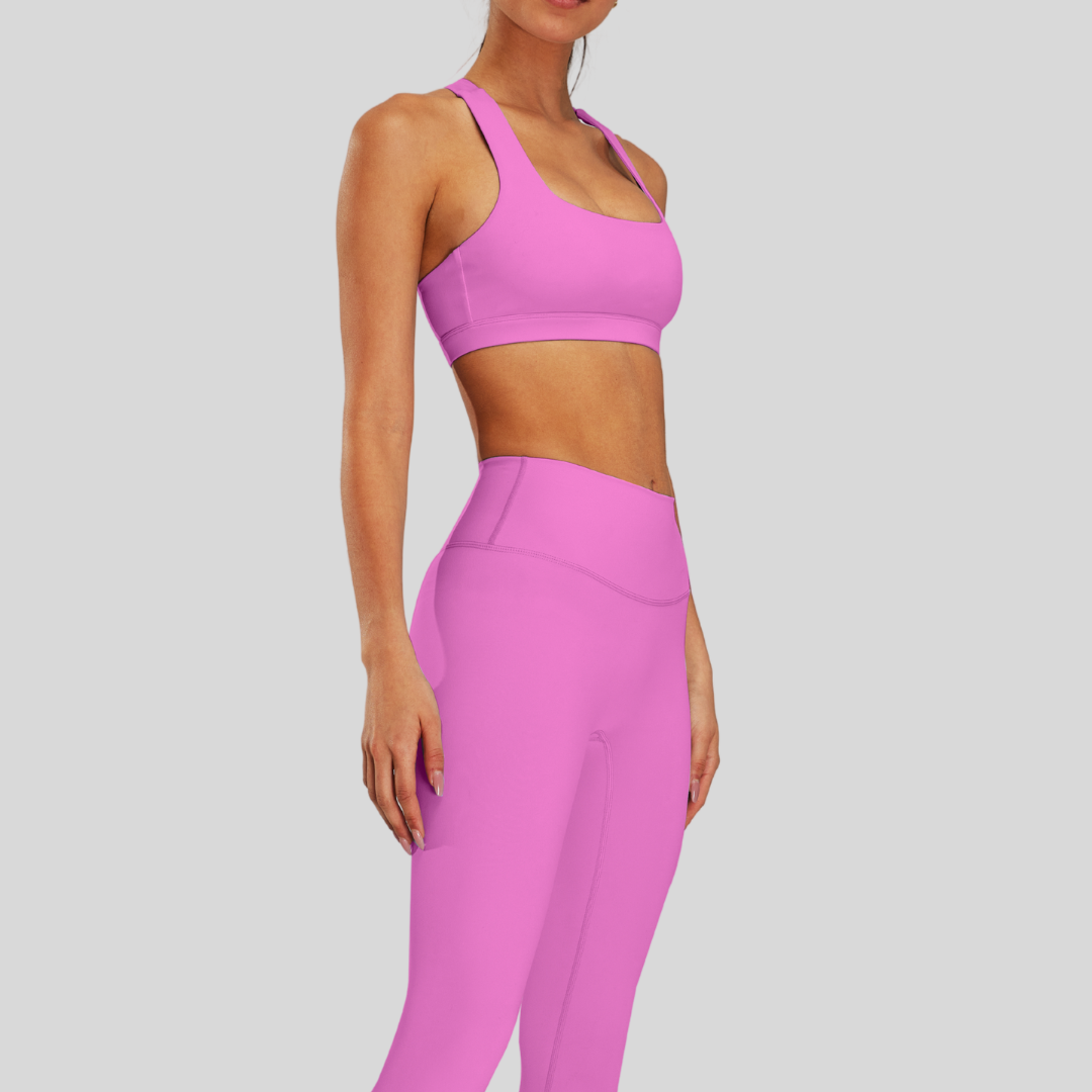 Side profile of model in Kaos The Label Bloom Set Pink, highlighting fit and design details.