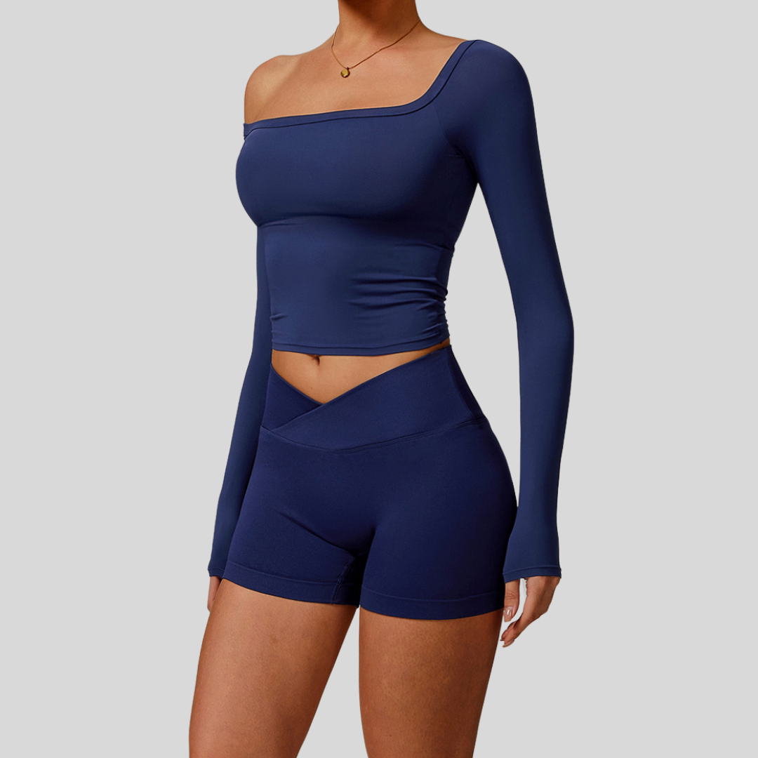 Side view of Kaos The Label Cleo Set in Navy, featuring longsleeve top and high-waisted shorts