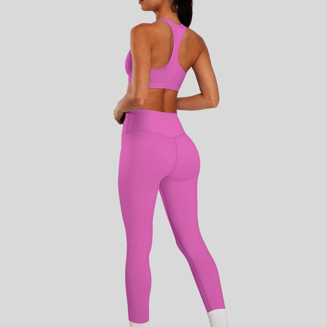 Back view of Kaos The Label high neck racer sports bra and high-waisted leggings