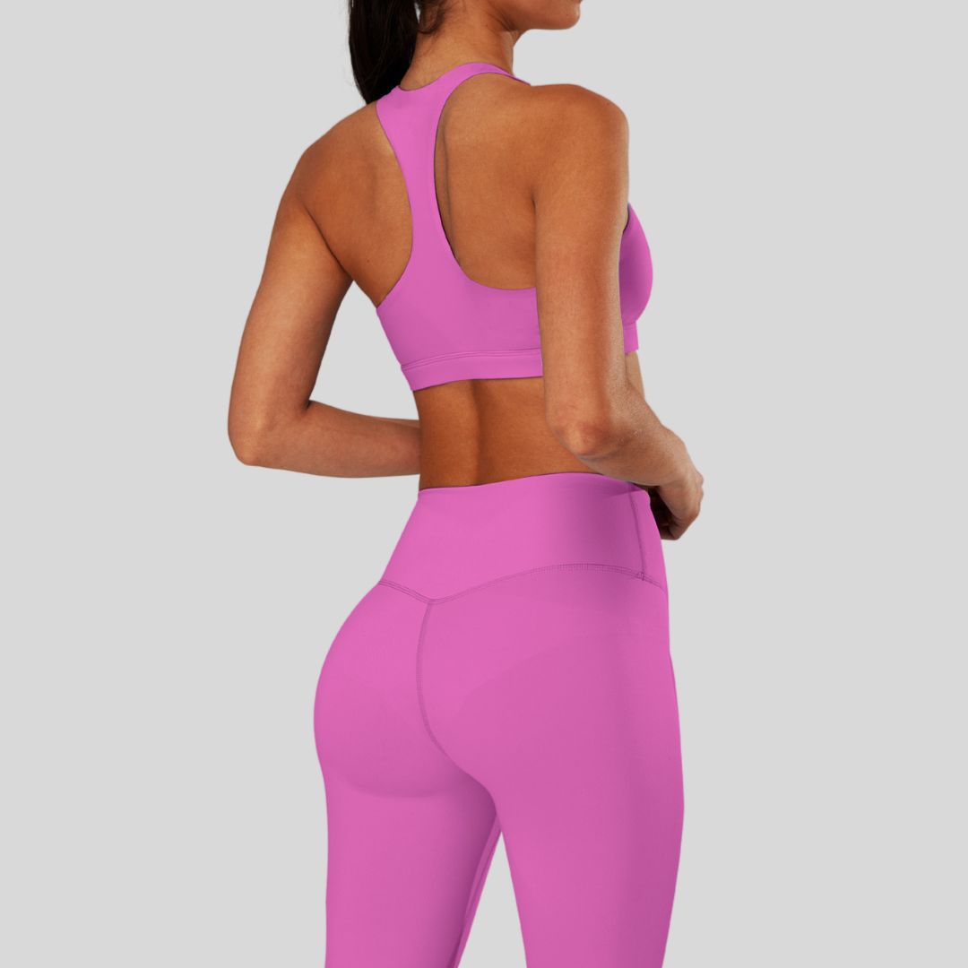 Back view of Kaos The Label Bloom Set in Pink, featuring high neck racer sports bra and high-waisted leggings