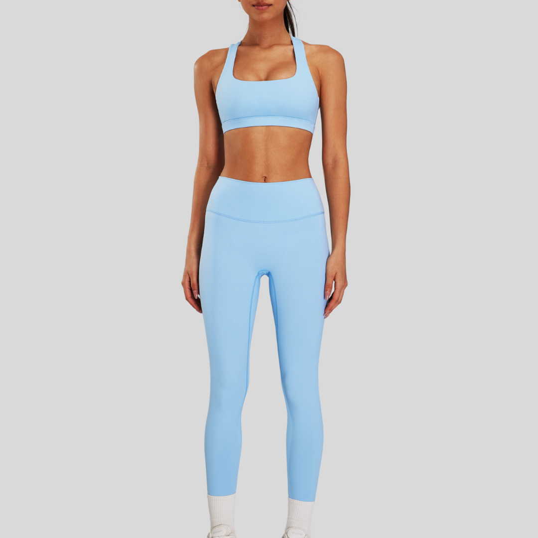Front view of Kaos The Label Bloom Set in Blue, featuring high neck racer sports bra and high-waisted leggings